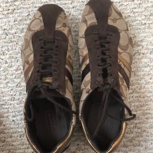 Coach sneakers with gold accents